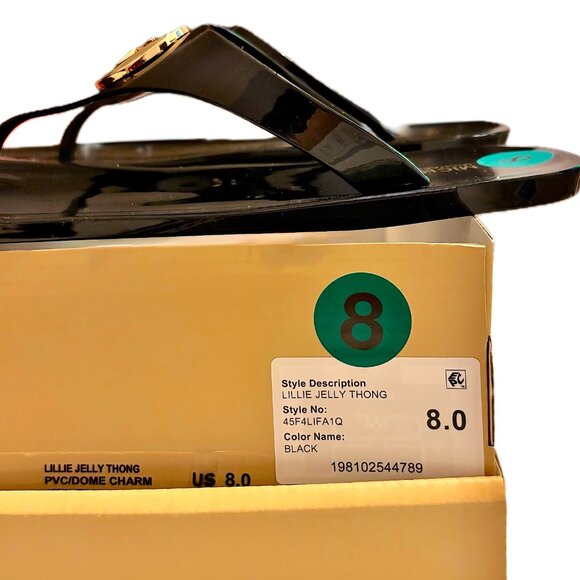 Michael Kors Lillie Jelly Thong Flat Sandal Black Gold Medallion Logo Sz 8  NWB - Picture 2 of 6